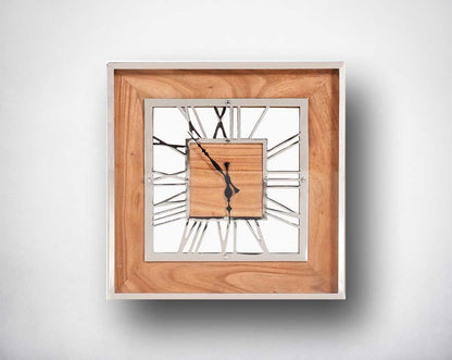 Square wall clock in nickel and wood in natural polish with roman numerals.