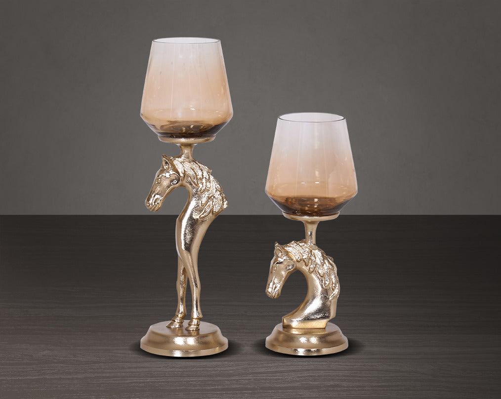 This vintage horse pillar candle holder with ombre grey lustre glass and gold-finished aluminium base 1 large 2 small