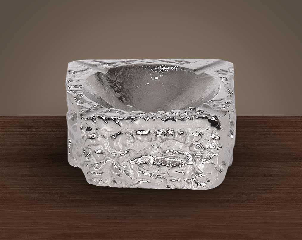 Nickel coated aluminium ashtray.