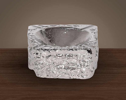 Nickel coated aluminium ashtray.