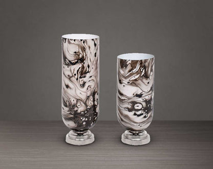 Hurricane candle holder in marquina enamel and nickel coated aluminium base. 1 large 2 small