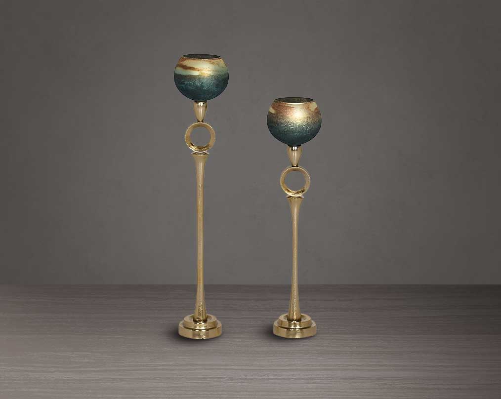 Decorative Goblet T-Lite holder in a champagne glass and antique gold aluminium base.