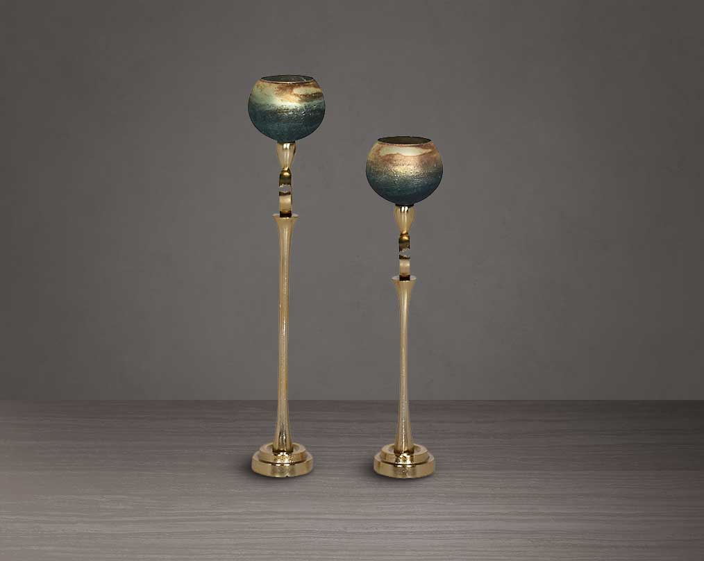 Decorative Goblet T-Lite holder in a champagne glass and antique gold aluminium base. 1 large 2 small