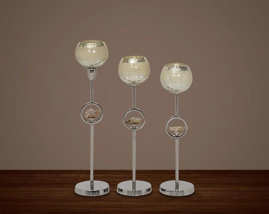 "Pillar goblet candle holder in taupe lustre glass with nickel-plated textured aluminum decorative base. " 1large 2 medium 3 small