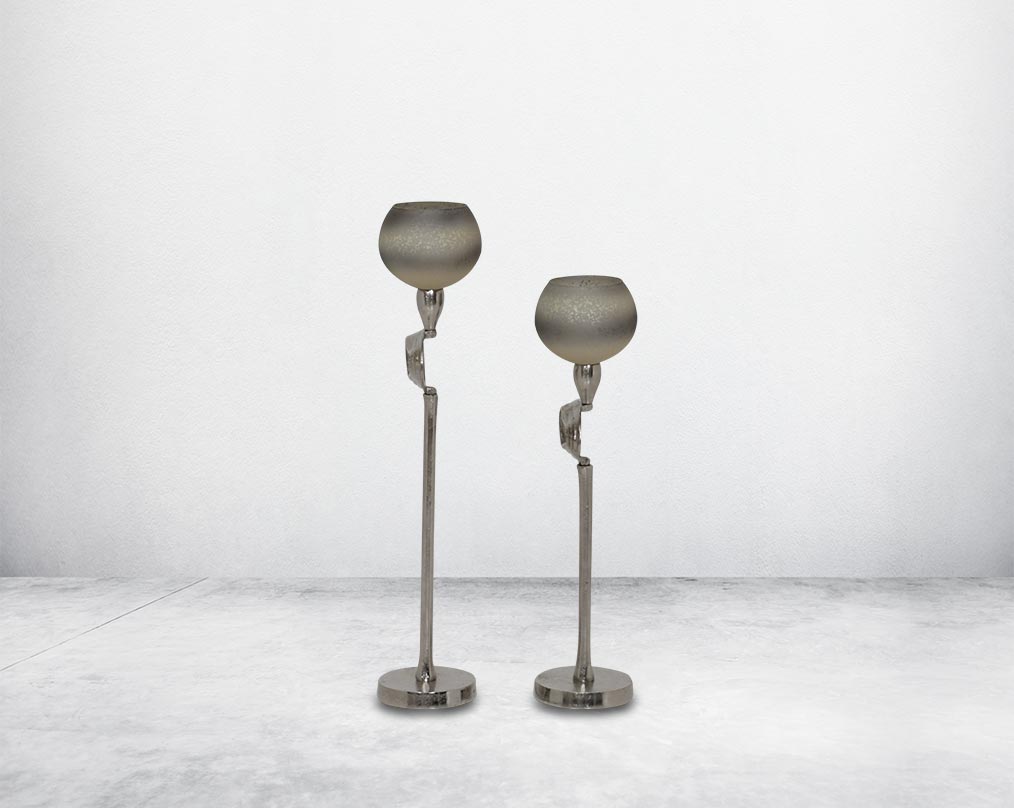"Pillar goblet candle holder in white & grey luster glass with nickel-plated textured aluminum decorative base. "