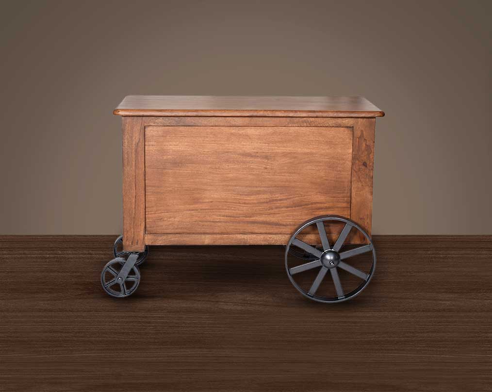 Wine cart/ bar with a vintage back look in mango wood and powder-coated iron wheels with storage.
