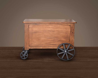 Wine cart/ bar with a vintage back look in mango wood and powder-coated iron wheels with storage.
