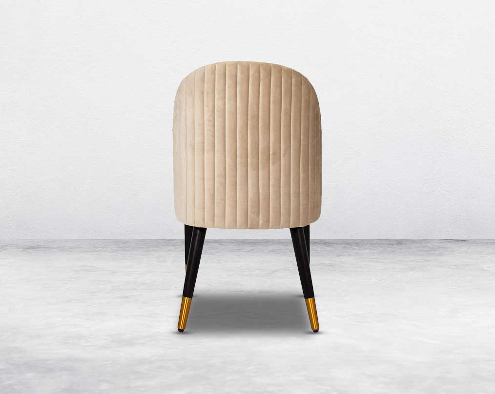 "Minimalistically designed chair back  with wooden legs for enhanced durability. it is a contemporary must have with padded fabric upholstery with a walnut base & metal splayed legs "