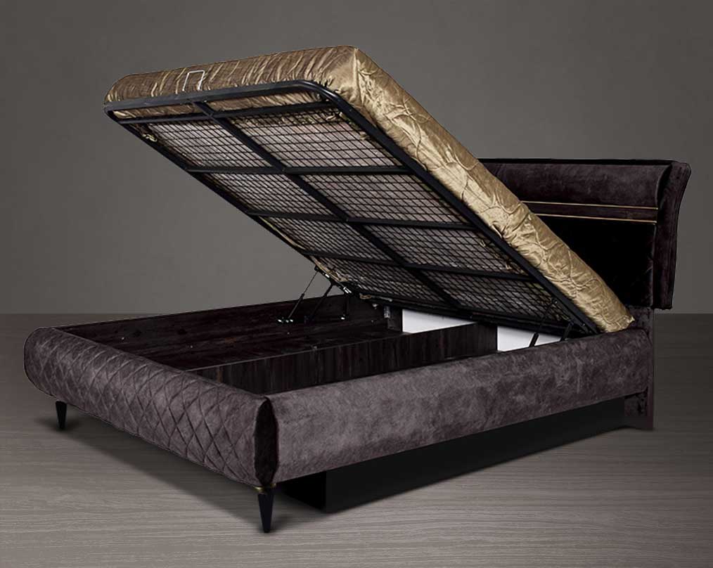 High back bed open  in king size in dark oak upholstered & quilted in fabric with antique gold design motif in modern classic design. The bed comes with hydraulic lift storage.