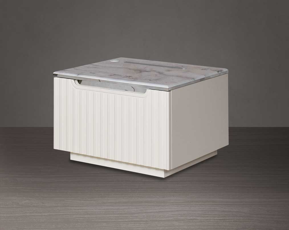 The bedside table comes with a marble finish top & lacquered in high gloss with a spacious drawer with a cream finish handle & base.