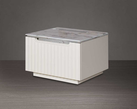 The bedside table comes with a marble finish top & lacquered in high gloss with a spacious drawer with a cream finish handle & base.