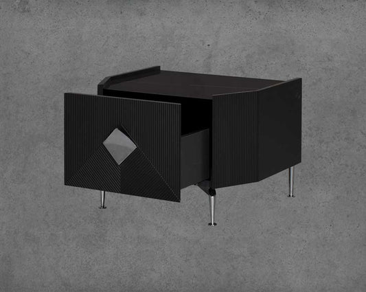 The gorgeous bedside table is in a black glossy finish with a spacious open  drawer with stainless steel handle & base.