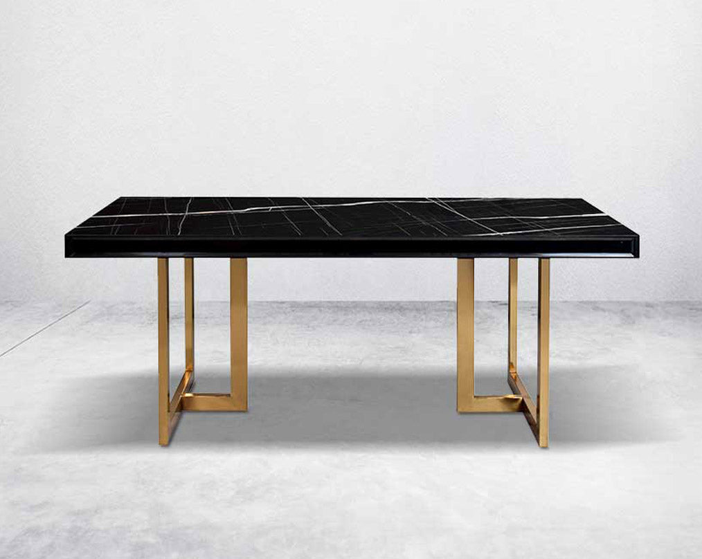 This 6-seater dining table comes with a black imitation Italian marble top & mirror frame/border with a stainless steel gold finished base in modern design.