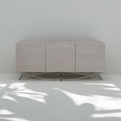 Modern sideboard with a metallic base against a white wall