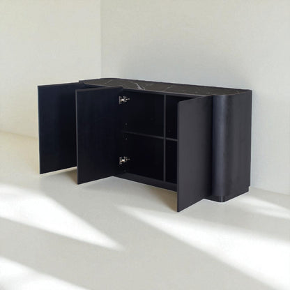 Black cabinet with open doors on a white floor and wall