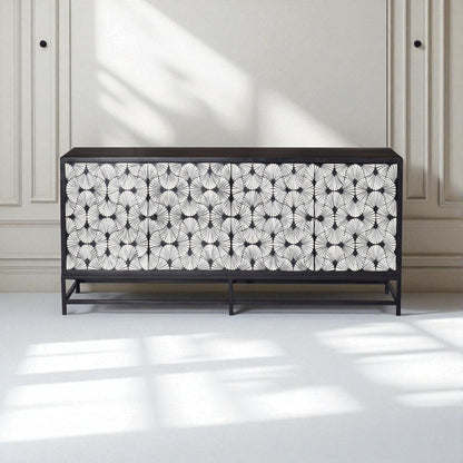 Cabinet with black and white patterned design in a room with light-colored walls and floor.