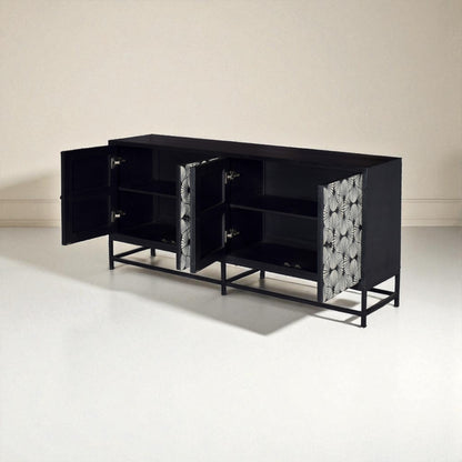 Black cabinet with patterned doors on a white floor and beige wall
