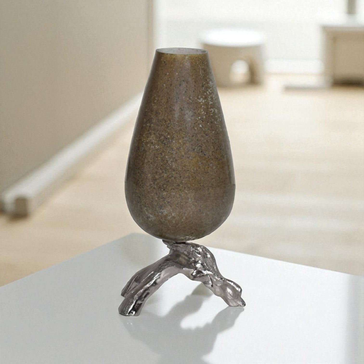 Decorative vase with a textured design on a white surface