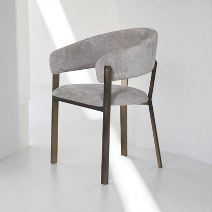 Gray upholstered chair with wooden legs on a white background
