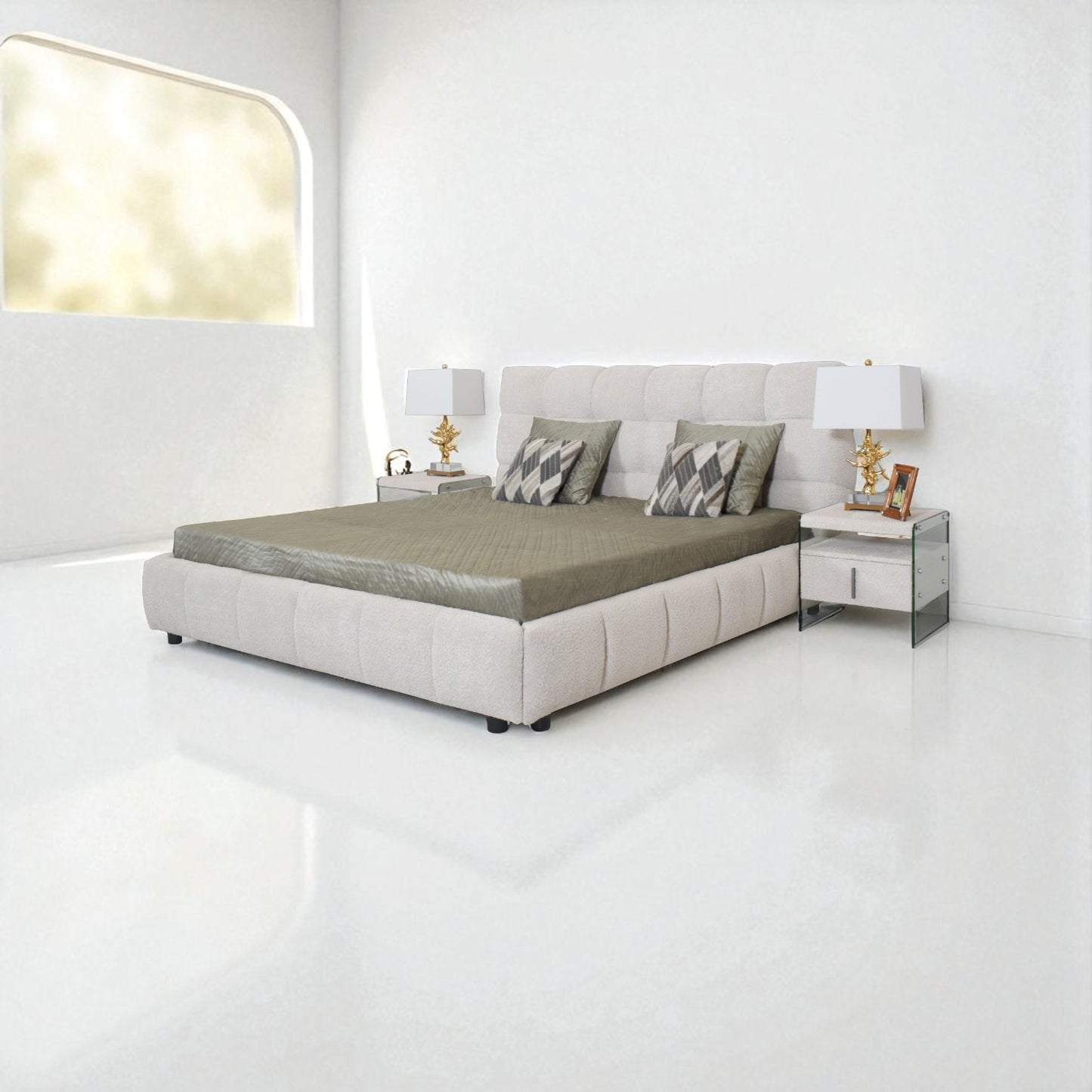 Modern bedroom with a gray upholstered bed, nightstands, and lamps.