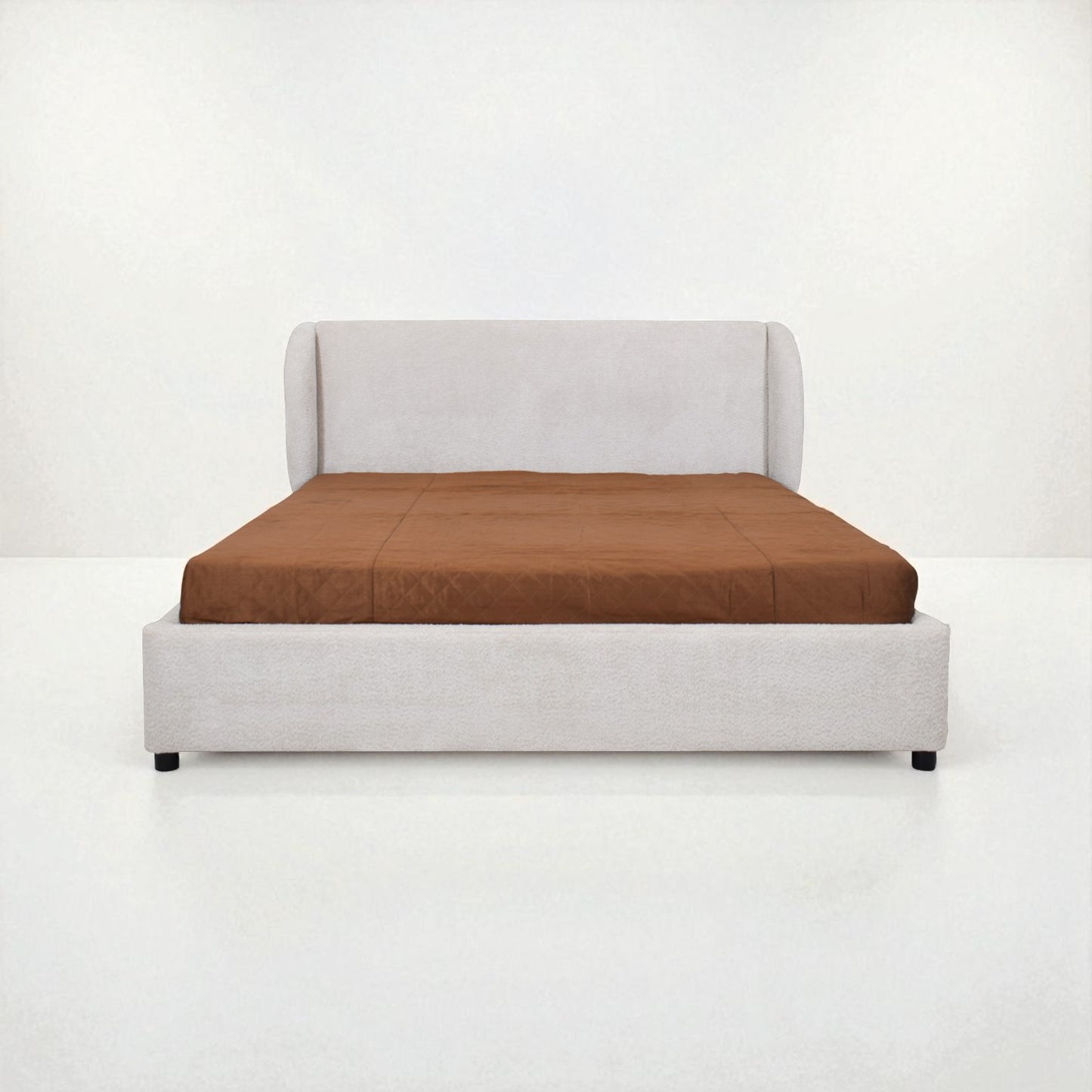 Bed with brown mattress and white frame on a white background