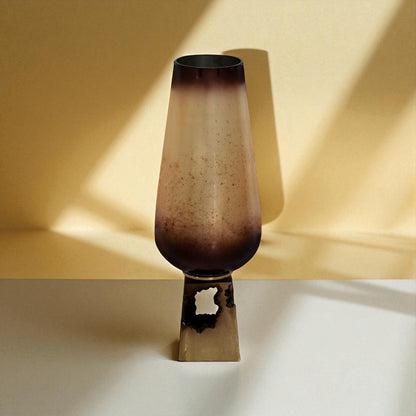 Decorative vase with a gradient design on a neutral background