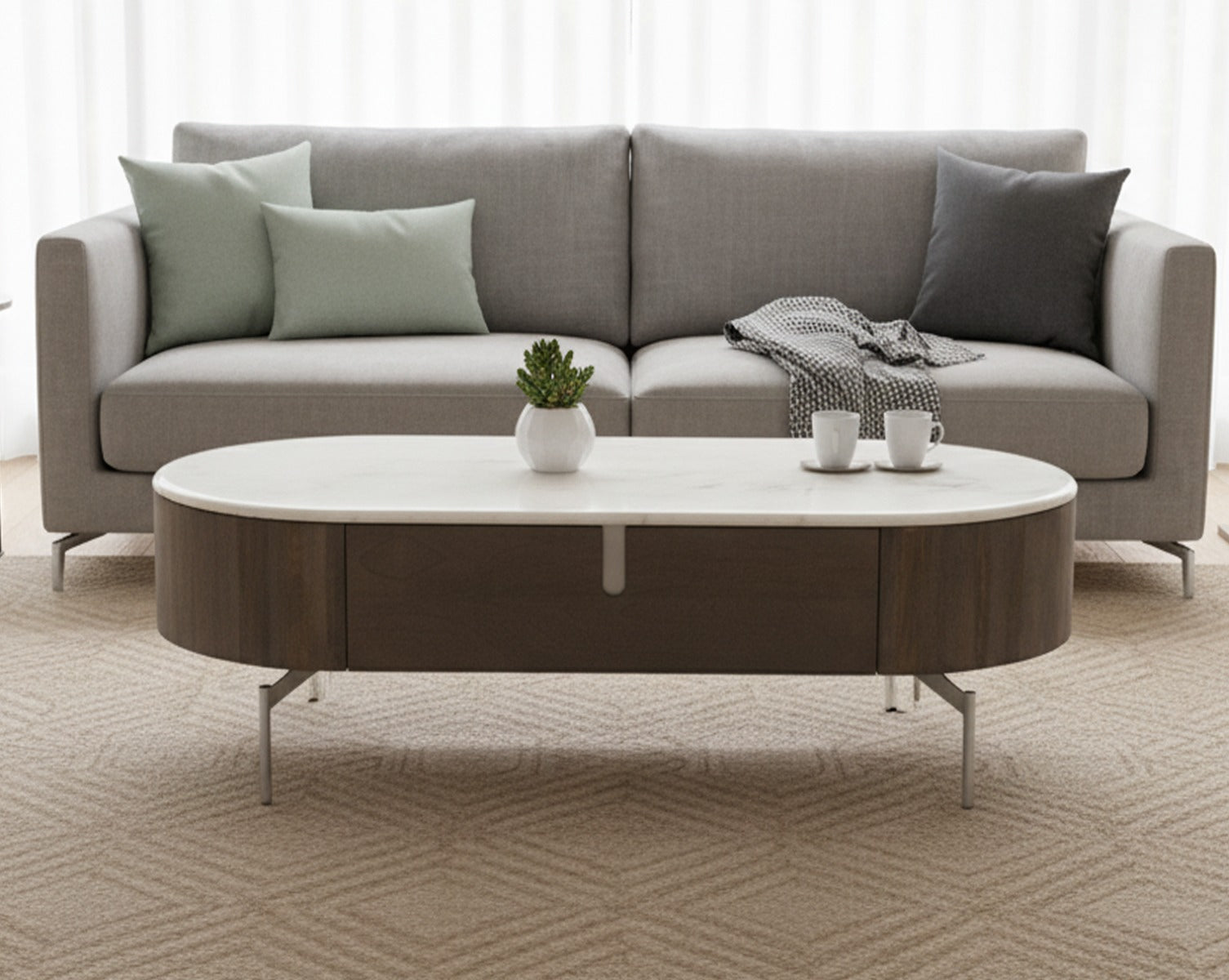 Gray sofa with a round coffee table in a living room setting