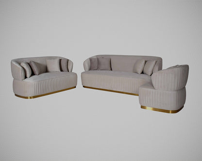 This 3+2+1 sofa set is an elegant statement piece with clean lines softened by subtle curves. Vertical channel quilting is an outstanding design detail on this sofa.