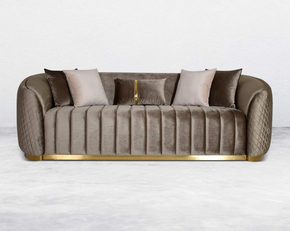 Agustín Fabric Sofa Set It has a gold-plated stainless base in modern classic design  This 3+2 seater sofa set is an elegant statement piece with clean lines softened by subtle curves. 