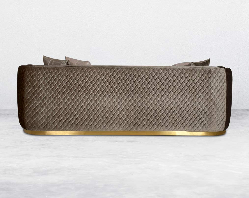 Agustín Fabric Sofa Set  behind It has a gold-plated stainless base in modern classic design  This 3+2 seater sofa set It has elegantly rounded armrests & and a soft seat cushion which comes in high-quality velvet fabric & 5 cushions to compliment.