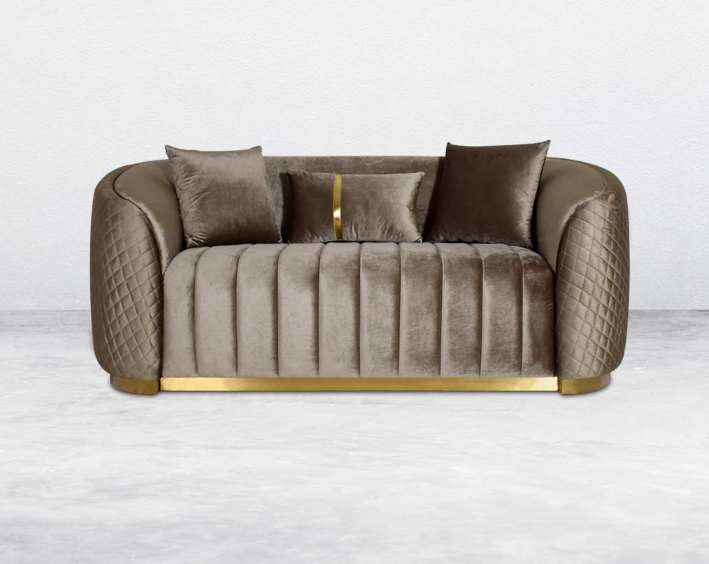 Agustín Fabric Sofa Set It has a gold-plated stainless base in modern classic design  This 2 seater sofa set It has elegantly rounded armrests & and a soft seat cushion which comes in high-quality velvet fabric & 3 cushions to compliment.