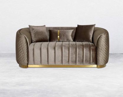Agustín Fabric Sofa Set It has a gold-plated stainless base in modern classic design  This 2 seater sofa set It has elegantly rounded armrests & and a soft seat cushion which comes in high-quality velvet fabric & 3 cushions to compliment.