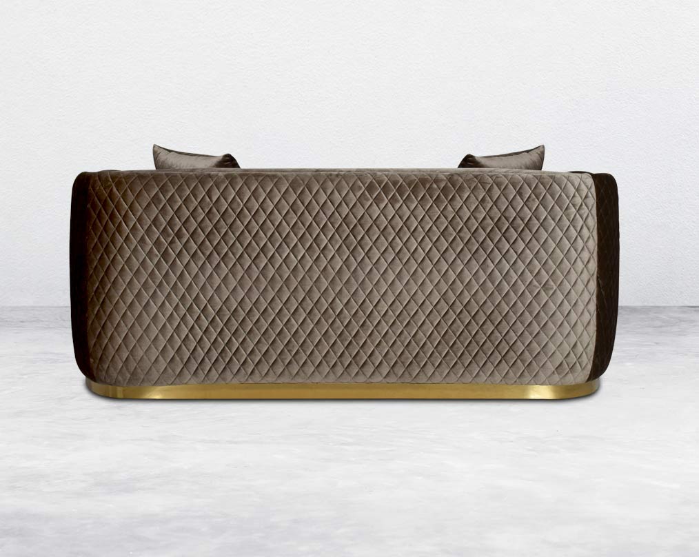 Agustín Fabric Sofa Set sofa is behind It has a gold-plated stainless base in modern classic design  This 2 seater sofa set It has elegantly rounded armrests & and a soft seat cushion which comes in high-quality velvet fabric & 3 cushions to compliment.