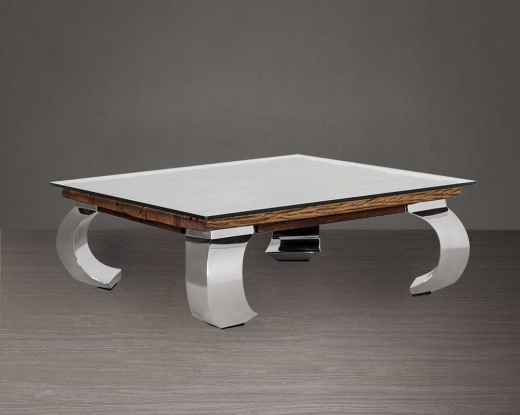 Coffee table with sleeper wood top which has been recycled from railway tracks in a rustic and natural finish with stainless steel base.