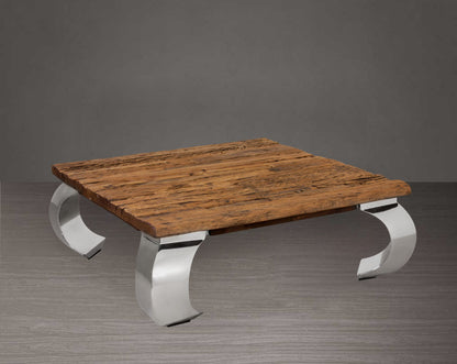 Coffee table with sleeper wood top which has been recycled from railway tracks in a rustic and natural finish with stainless steel base.