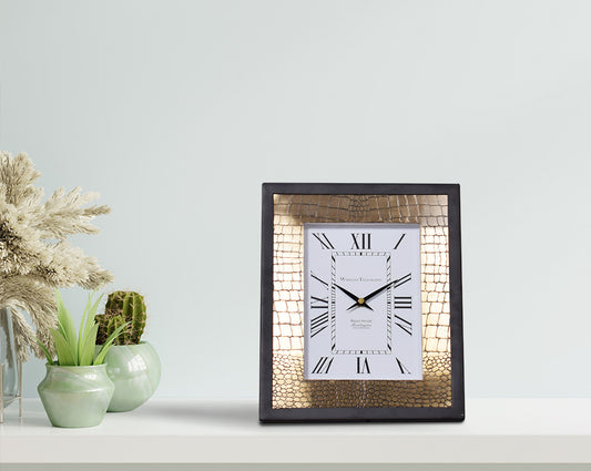 Rectangular table clock in croc etched design in matt antique brass finish & matt black frame with Roman numerals in rich contemporary design with table 